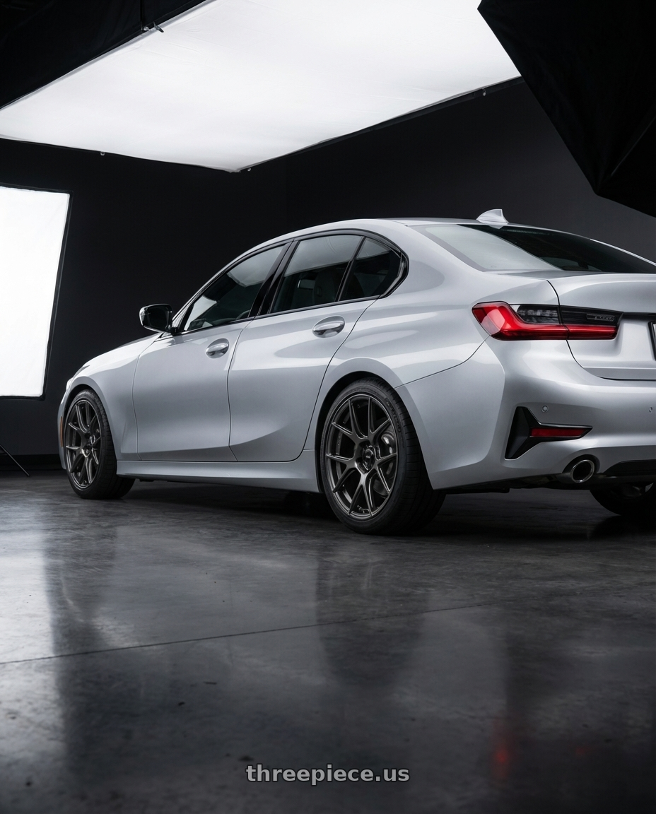 2023 BMW 3 Series G20 with Konig Ampliform 5x112 19x8.5+32 Dark Metallic Graphite wheels rear three quarter view square tires