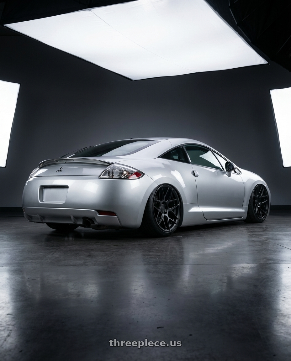 2010 Mitsubishi Eclipse with Aodhan AFF2 5x114.3 19x8.5+35 Matte Black wheels rear three quarter view slight stretch tires