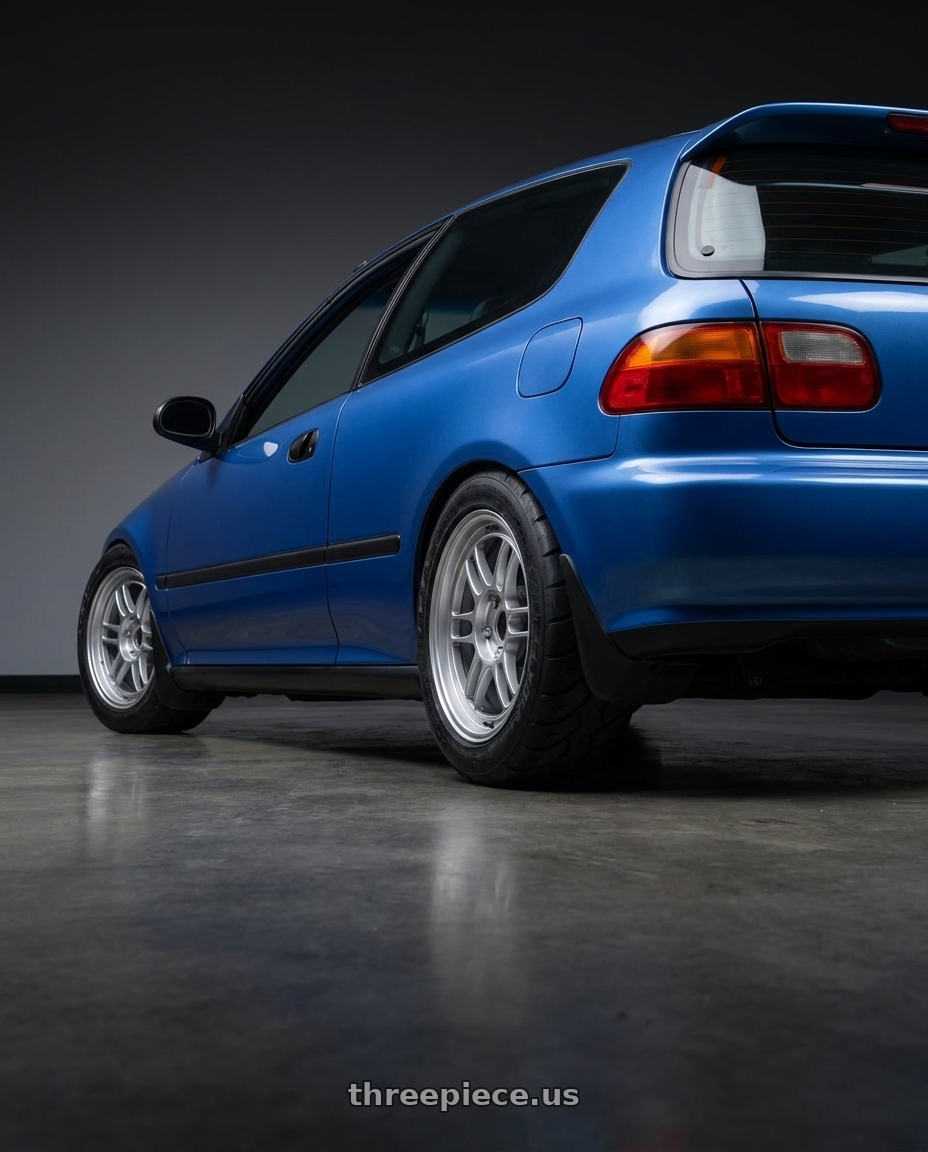 1995 Honda Cuvic with Enkei RPF1 4x100 15x7+35 Silver wheels rear three quarter view meaty tires