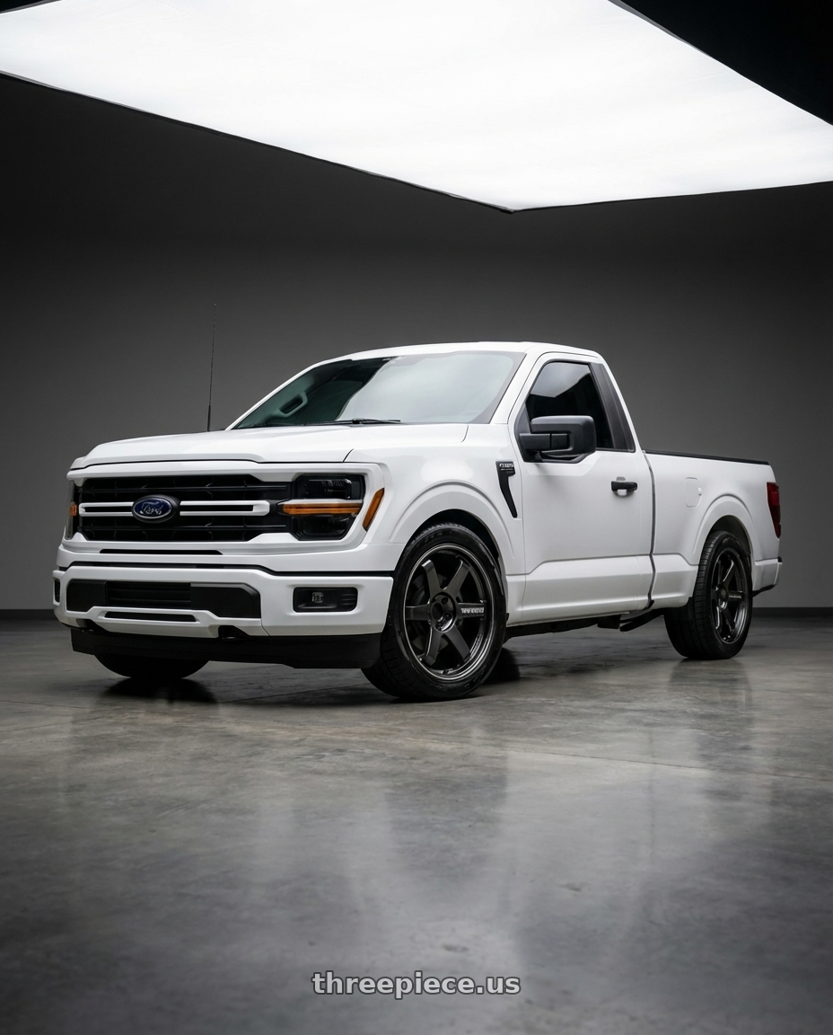 2024 Ford F150 with Volk Racing TE37 Ultra Large PCD 6x139.7 20x8.5+45 Diamond Dark Gunmetal wheels front three quarter view lowered stance