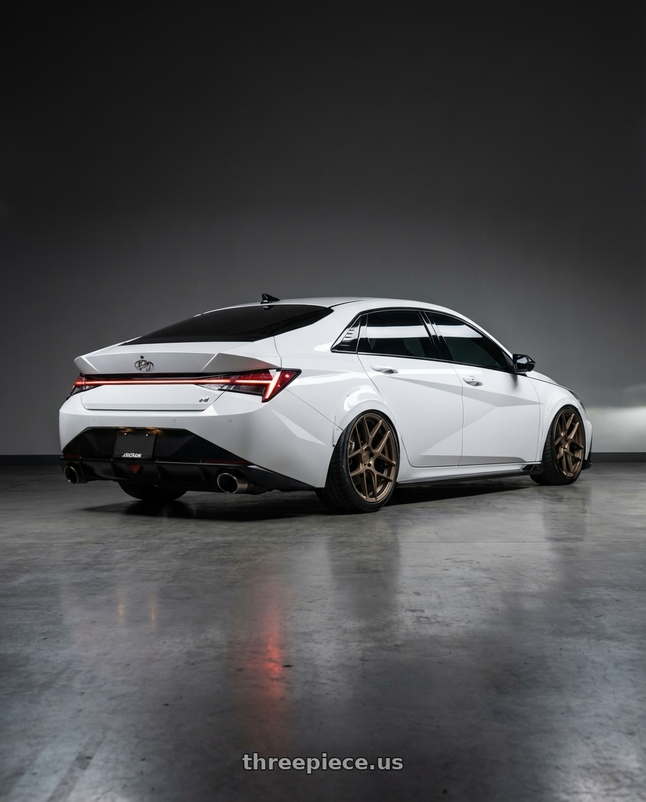 2024 Hyundai Elantra N with Aodhan AFF2 5x114.3 19x9.5+35 Matte Bronze wheels rear three quarter view slight stretch tires