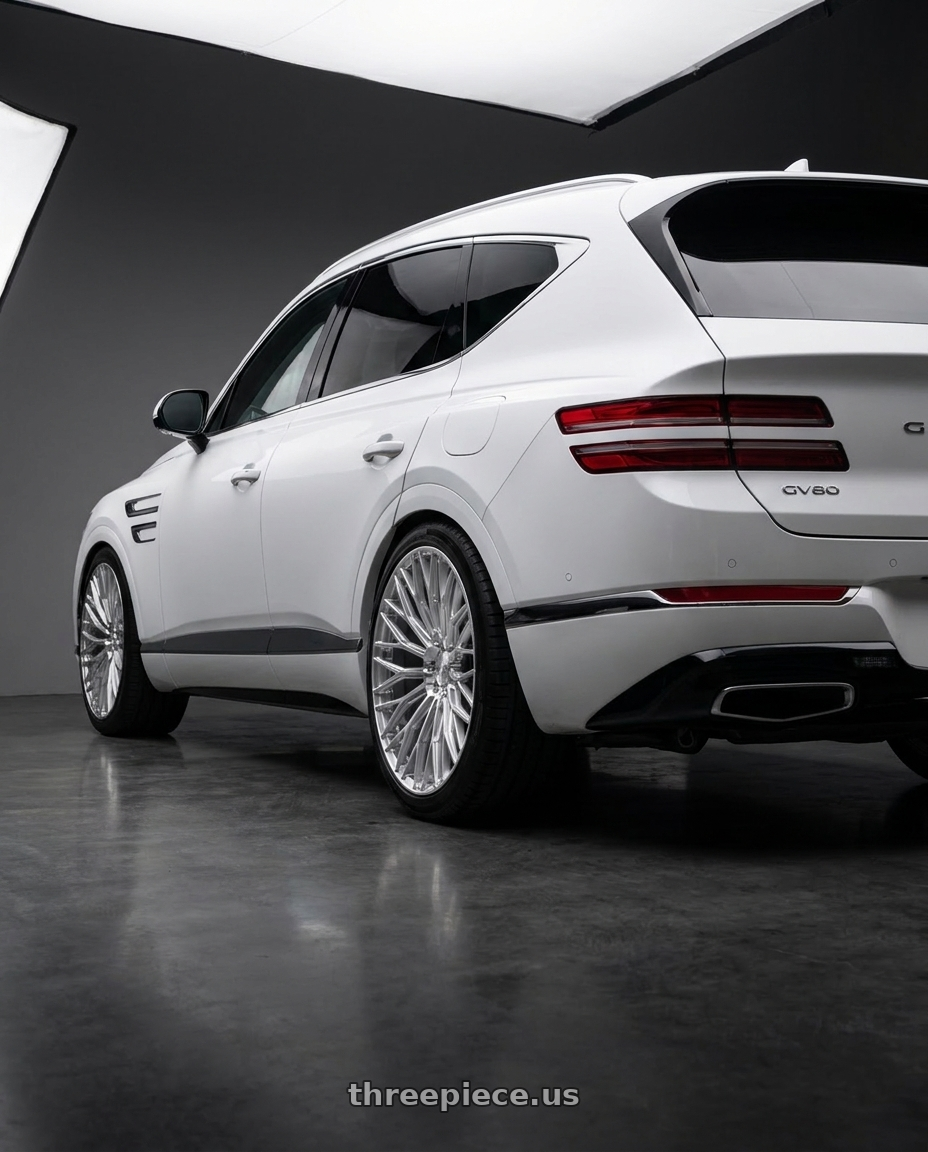 2027 Genesis GV80 with AL13 FR100 5x114.3 22x10 +35 Diamond Silver wheels rear three quarter view square tires