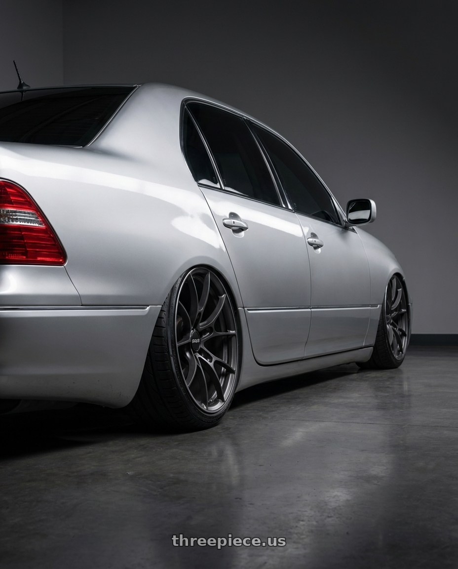 2004 lexus ls430 with Volk Racing G025 5x114.3 20x9.5 +40 MATTE GUNBLACK / DC wheels rear three quarter view extreme stretch tires