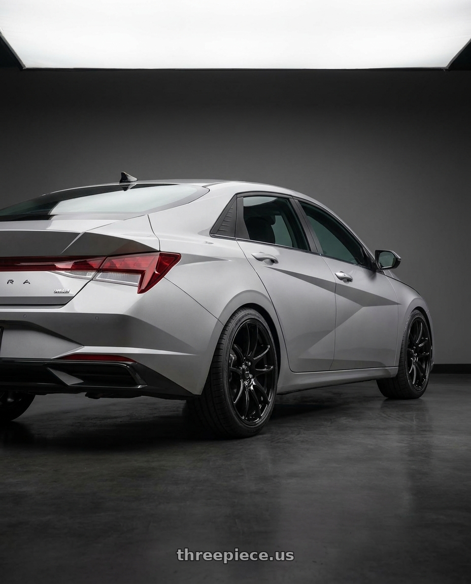2021 Hyundai Elantra Limited with Vors TR4 5x114.3 18x8.5  +35 Gloss Black wheels rear three quarter view square tires