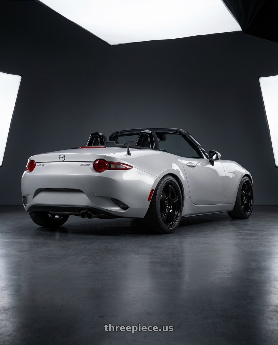 2021 Mazda MX-5 Miata ND with Gram Lights 57CR 5x114.3 17x9+12 Glossy Black wheels rear three quarter view square tires