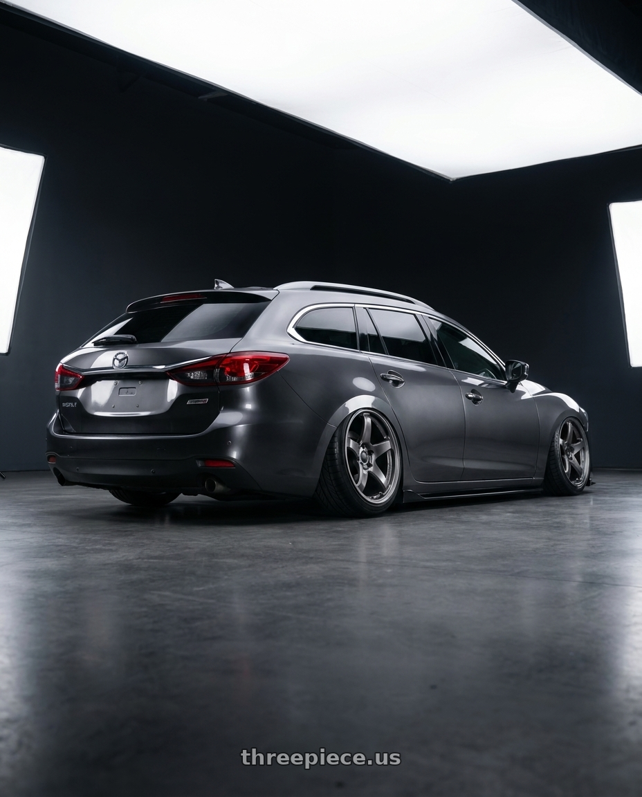 2019 Mazda 6 wagon with Enkei PF05 5x114.3 18x8.5+38 Dark Silver wheels rear three quarter view meaty tires