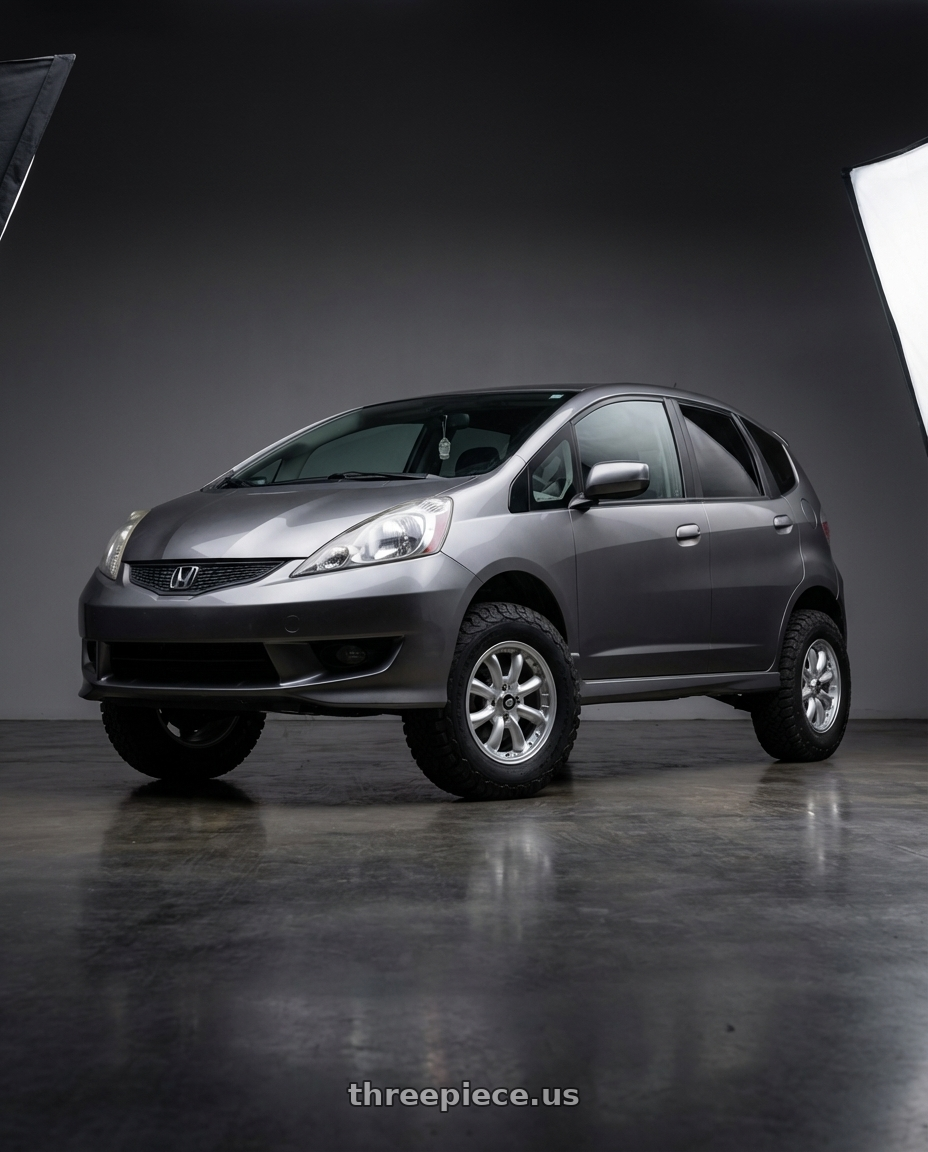 2013 Honda fit with Enkei Compe 4x100 16x7+38 Silver wheels