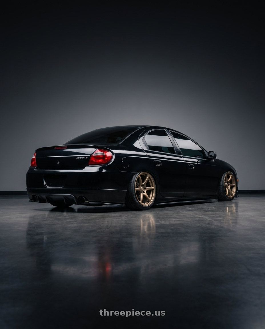 2005 dodge srt4 with Kansei K11B Tandem 5X100 18x8.5 35 Bronze wheels rear three quarter view slight stretch tires