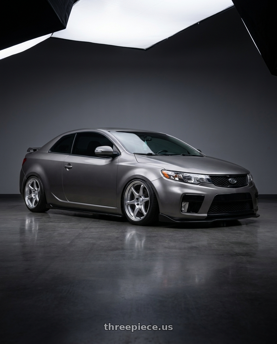 2011 Kia Forte Koup SX (Titanium Paint color) with Kansei K11S Tandem 5x114.3 18x8.5 35 Hyper Silver wheels