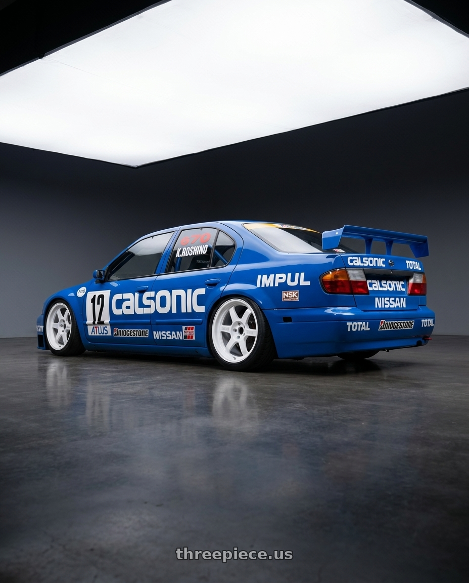 1997 Nissan primera with Volk Racing TE37V 10th Anniv 5x114.3 18x9.5+0 Dash White wheels rear three quarter view slight stretch tires