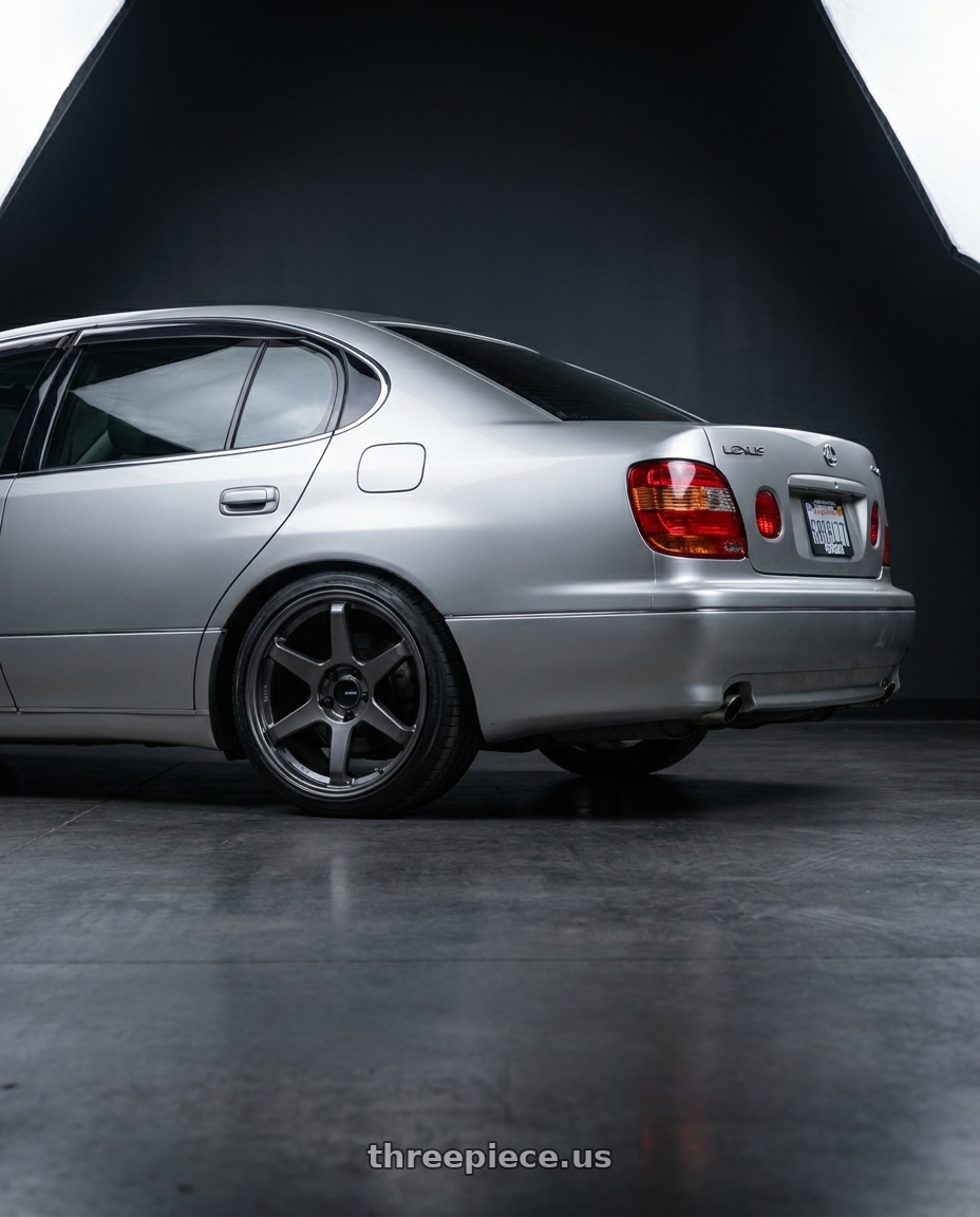 2001 lexus gs 300 with Enkei T6R 5x114.3 18x9.5+38 Matte Gunmetal wheels rear three quarter view square tires