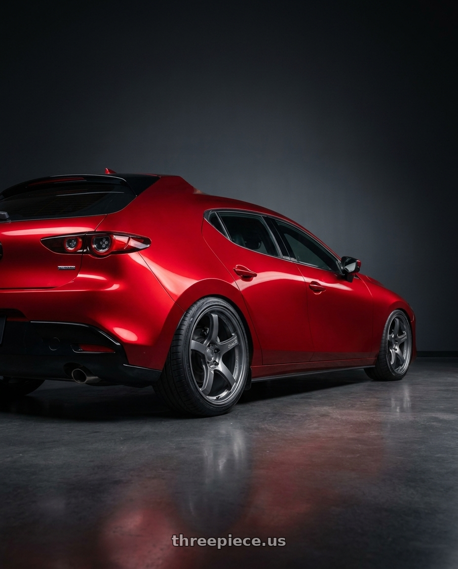 2024 Mazda 3 with Gram Lights 57CR 5x114.3 19x9.5 +35 GLOSSY GRAY wheels rear three quarter view slight stretch tires