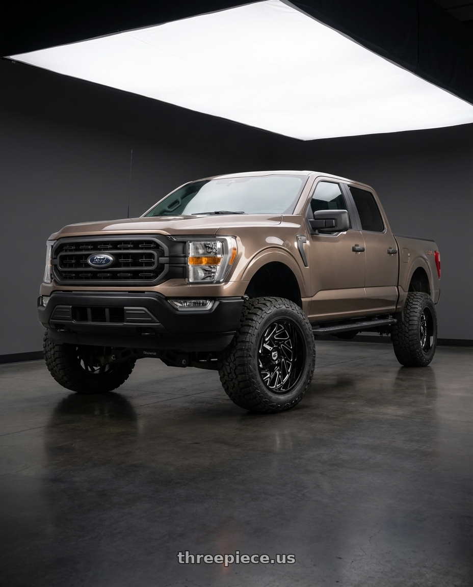 2013 Ford F-150 with Gear Off Road 769BM 6X135/6x139.7 22x10 -19 Gloss Black Milled wheels front three quarter view lifted stance