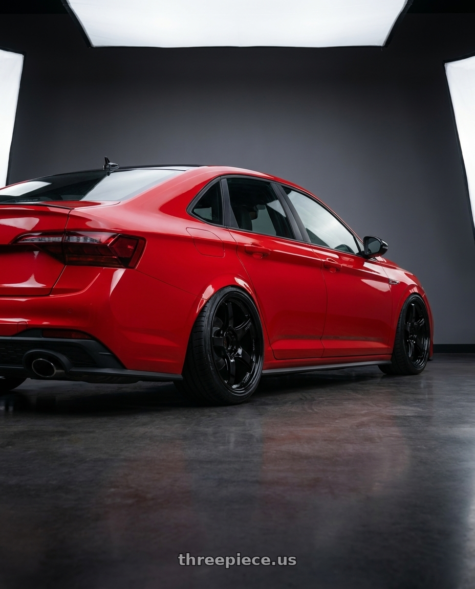 2023 Volkswagen Jetta GLI MK7 with Gram Lights 57CR 5x112 19x10.5+22 Glossy Black wheels rear three quarter view slight stretch tires