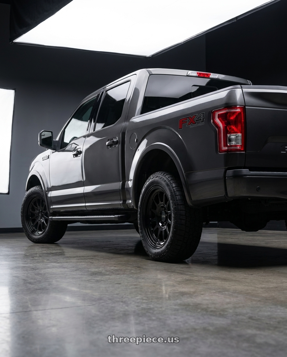 2018 Ford F-150 XLT with Method Race Wheels 318B 6X135 17x8.5 +0 GLOSS BLACK wheels rear three quarter view square tires