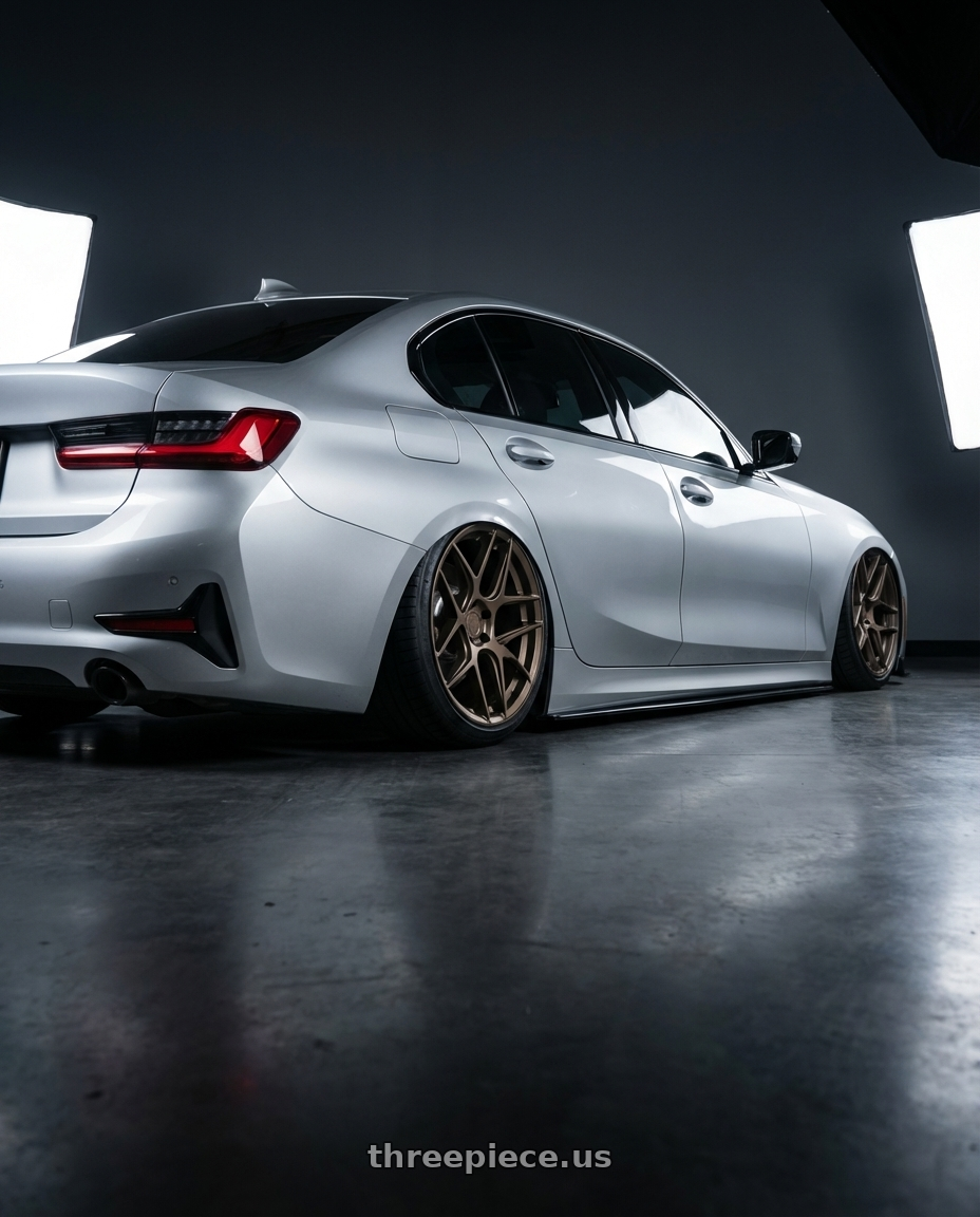 2023 BMW 3 Series G20 with Aodhan AFF2 5x112 19x9.5+35 Matte Bronze wheels rear three quarter view slight stretch tires