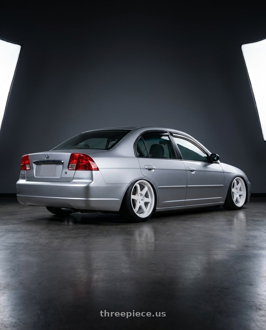 2002 Honda civic with 9six9 SIX-1 5x100 17X8 +35 Competition White wheels rear three quarter view slight stretch tires