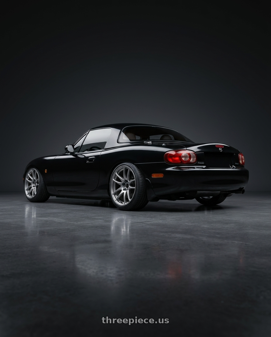 2003 mazda mx 5 nb with Work Emotion Cr Kiwami 4x100 16x6.5 +48 Gt Silver wheels rear three quarter view slight stretch tires