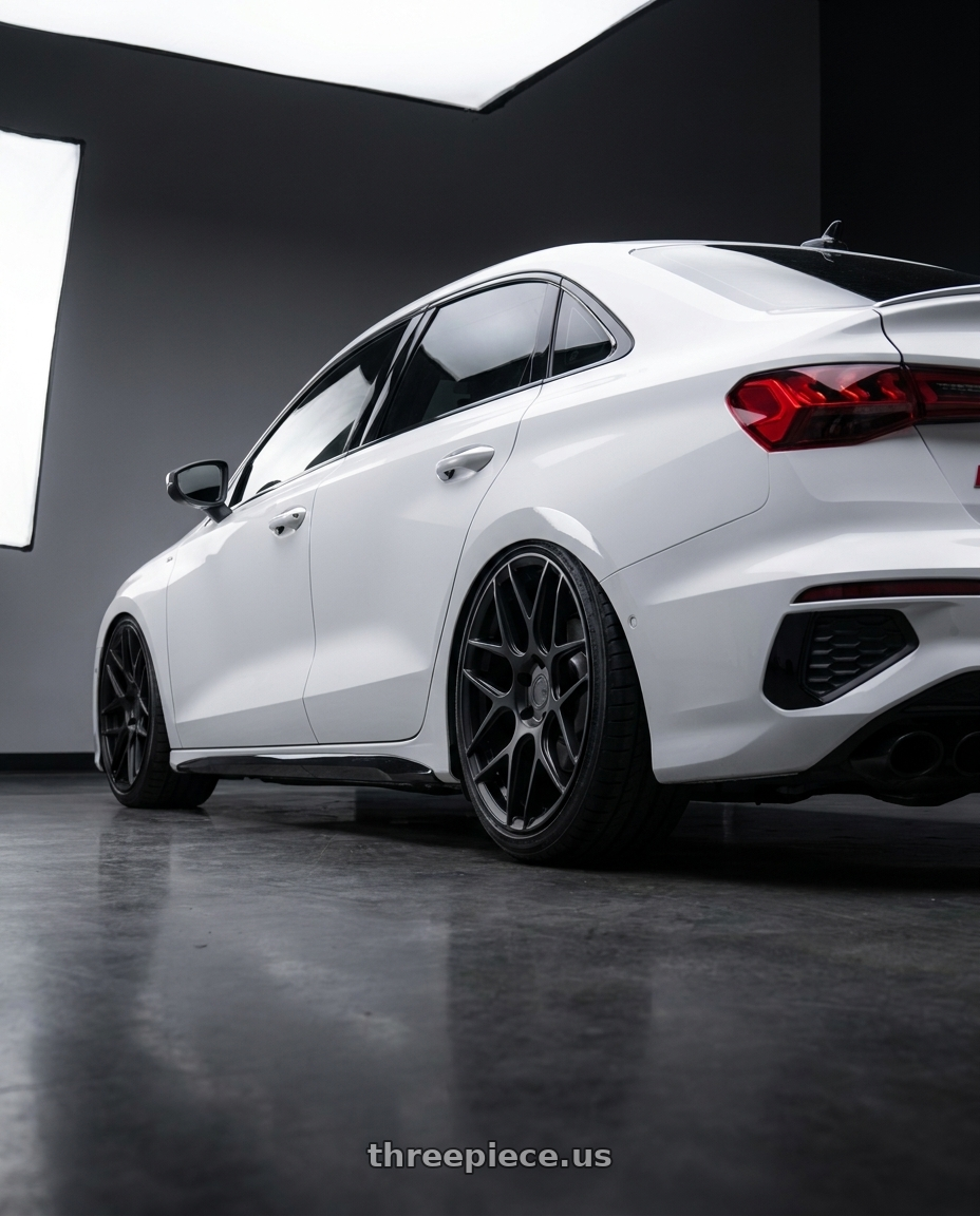 2024 Audi S3 8Y with Aodhan AFF2 5x112 19x8.5+35 Matte Black wheels rear three quarter view slight stretch tires