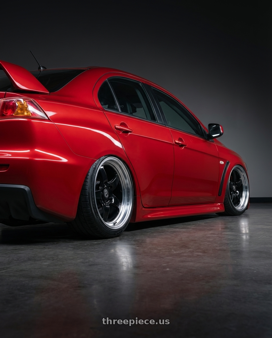 2012 Mitsubishi Lancer Evo X with Forgestar D5 Drag 5x114.3 18x10 +42 Gloss Black Machined wheels rear three quarter view slight stretch tires