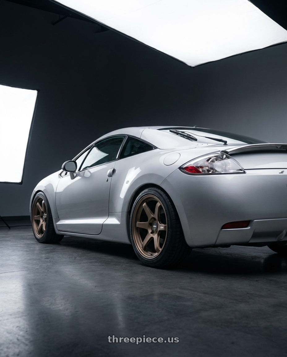 2010 Mitsubishi Eclipse with ESR Wheels APEX SERIES AP6 5x114.3 18x10.5 +22 Matte Bronze wheels rear three quarter view square tires