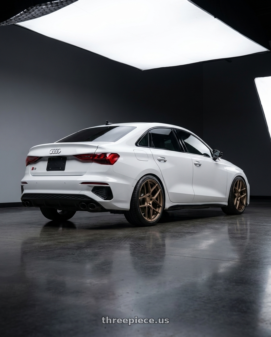 2024 Audi S3 8Y with Aodhan AFF2 5x112 19x8.5+35 Matte Bronze wheels rear three quarter view square tires