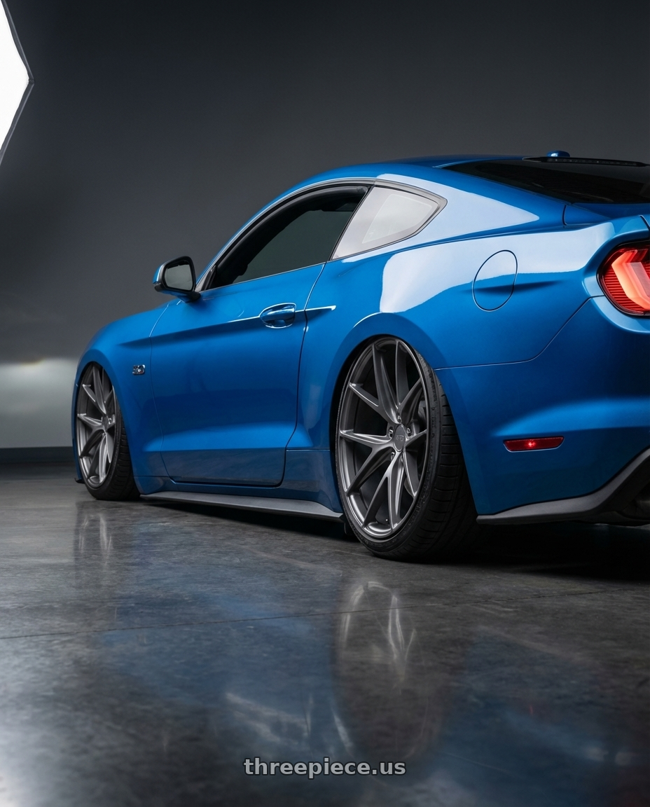 2022 Ford Mustang GT with Niche 1PC M116 MISANO 5X114.3 20X10.5 +30 MATTE GUN METAL wheels rear three quarter view slight stretch tires