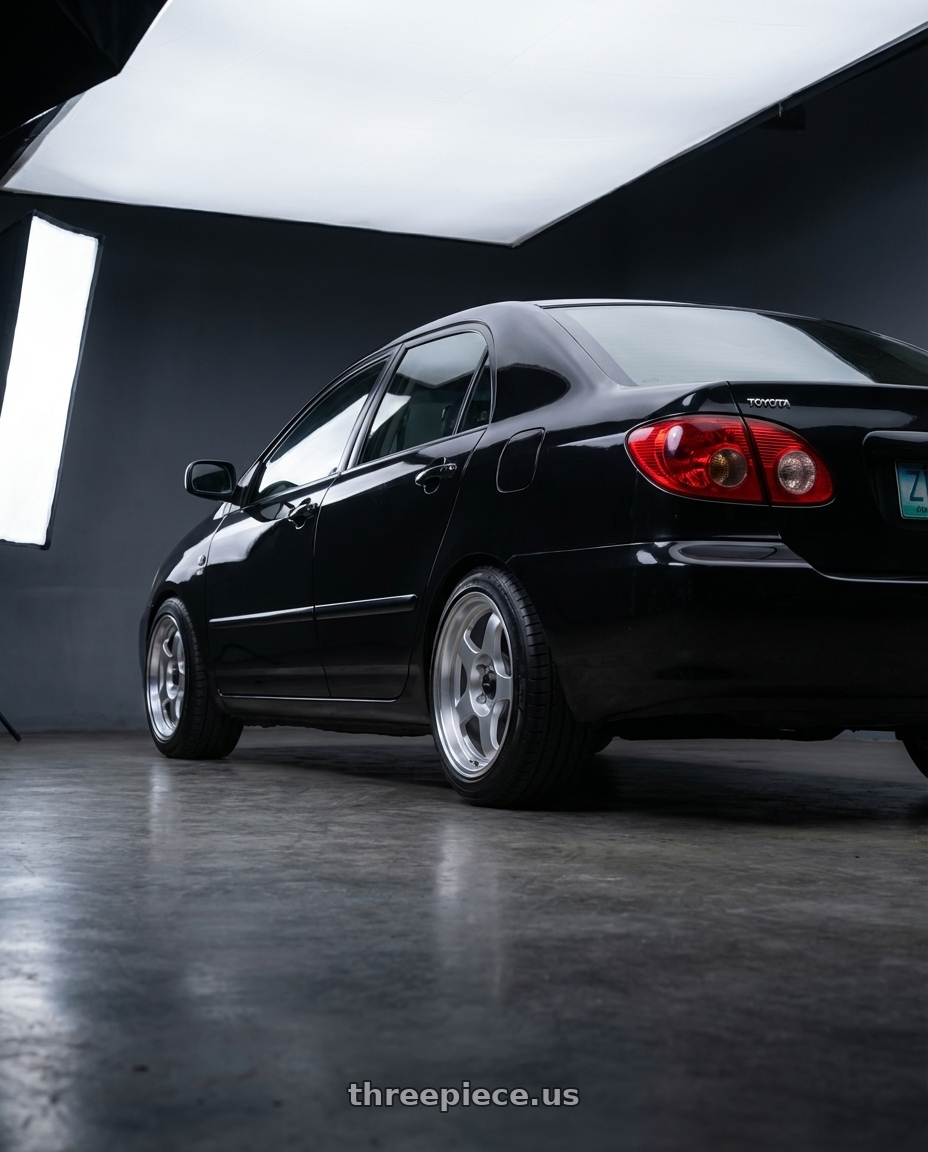 2006 Toyota Corolla Altis with Vors SP1 4x100/4x114.3 16x7  +38 Silver Machine Face Lip wheels rear three quarter view square tires