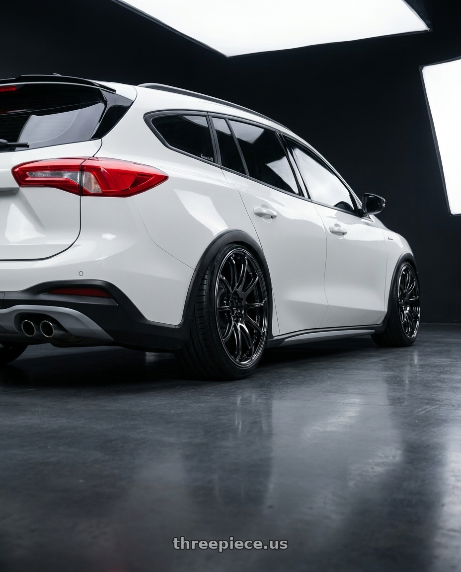Focus active wagon 2024 with Advan Racing RSIII 5x114.3 19x8.0 +45 BLACK CHROME wheels rear three quarter view extreme stretch tires
