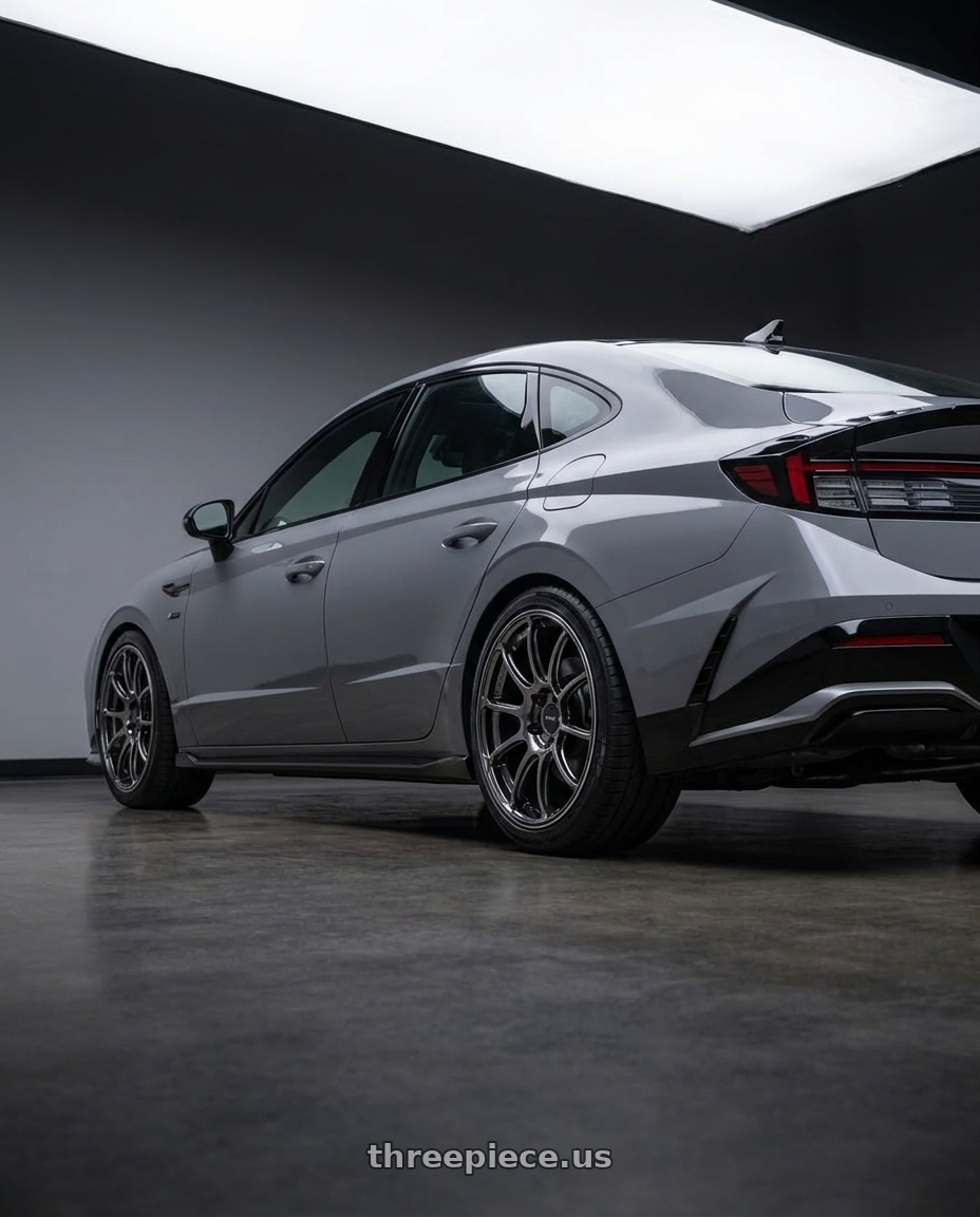 2025 Hyundai Sonata N Line with Advan RZ II 5x114.3 19x9.0+45 Racing Hyper Black And Ring wheels rear three quarter view square tires