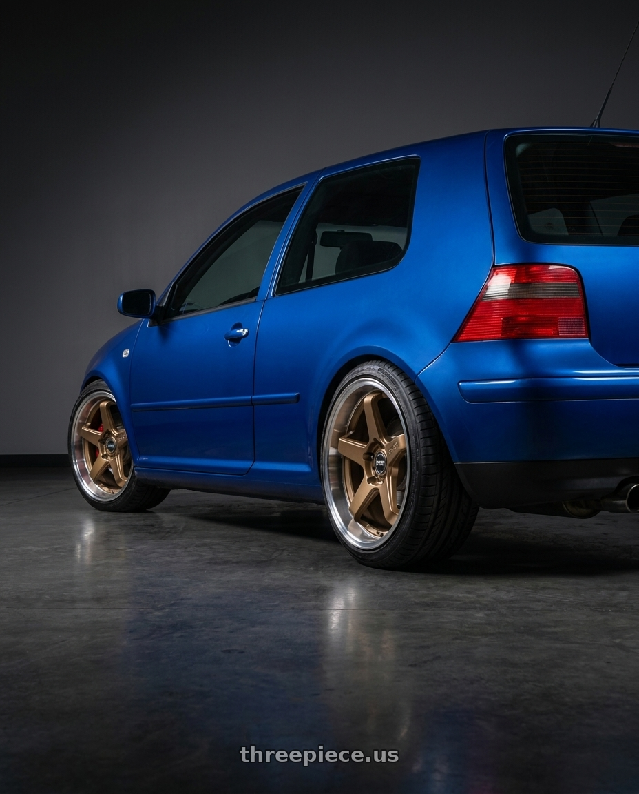 2002 Volkswagen golf gti 1.8t with F1R FC5 5x100 18x8.5 +35 Satin Bronze/Polish Lip wheels rear three quarter view slight stretch tires