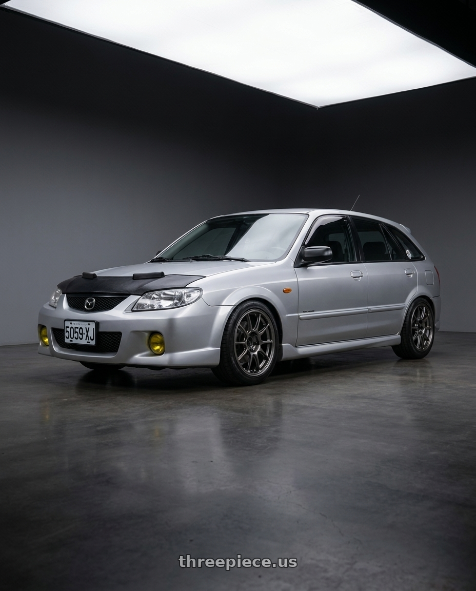 Mazda portege5  2000 with WedsSport TC105X 4x100 16x7.0+36 EJ Titan wheels