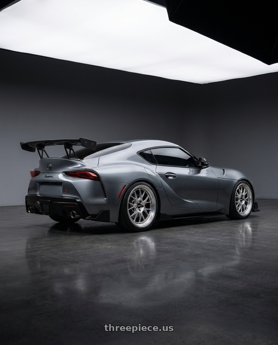 2019 TOYOTA SUPRA with BBS LM-R 5x112 19x9.5+38 Diamond Silver wheels rear three quarter view square tires