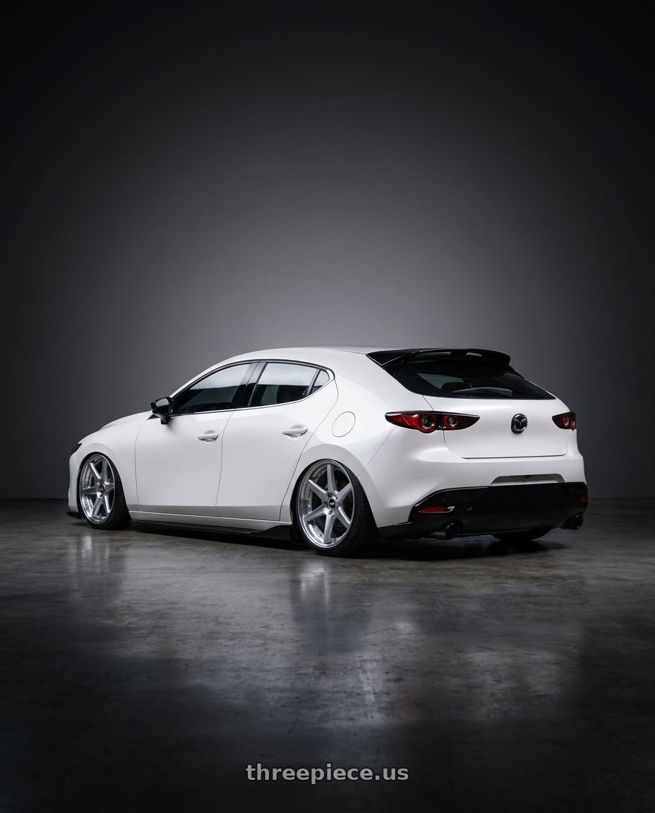 2024 Mazda3 Fastback  with Work Zeast St1 5x100 18x7.5+22 O Disk Brush Silver Clear wheels rear three quarter view slight stretch tires