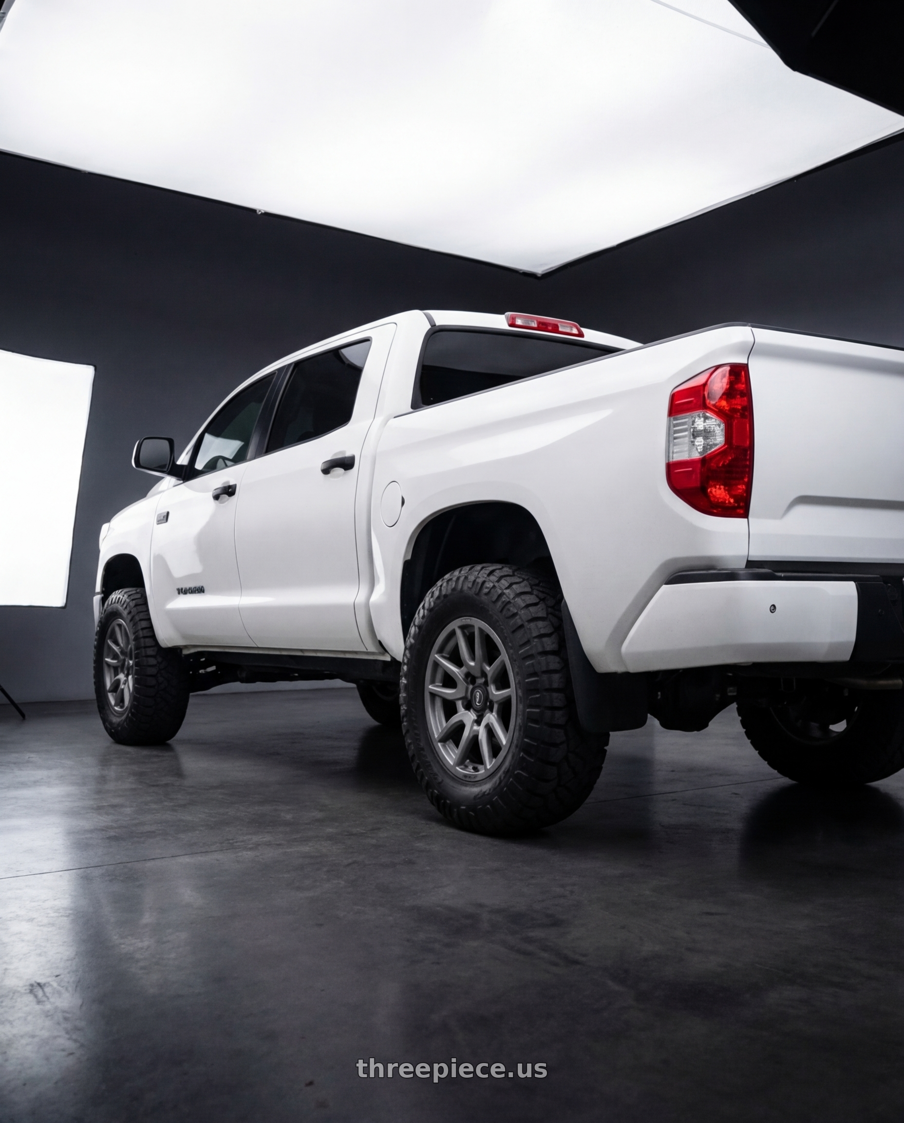 2021 Toyota tundra with Icon Alloys VECTOR 5 5x150 17x8.5+25 TITANIUM wheels rear three quarter view meaty tires