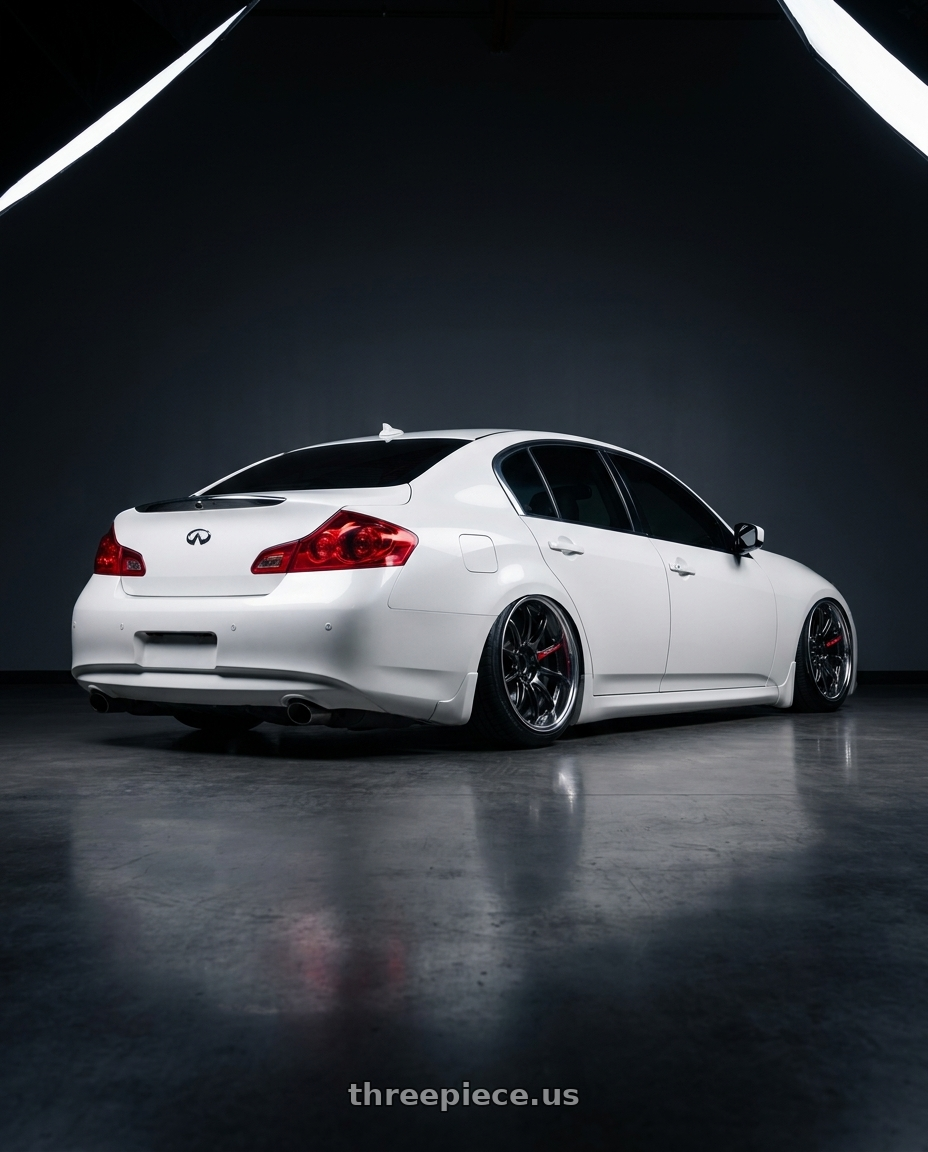 2012 Infiniti G37 with Work Zr10 2P 5x114.3 18x10.0 +38 Glim Black wheels rear three quarter view slight stretch tires