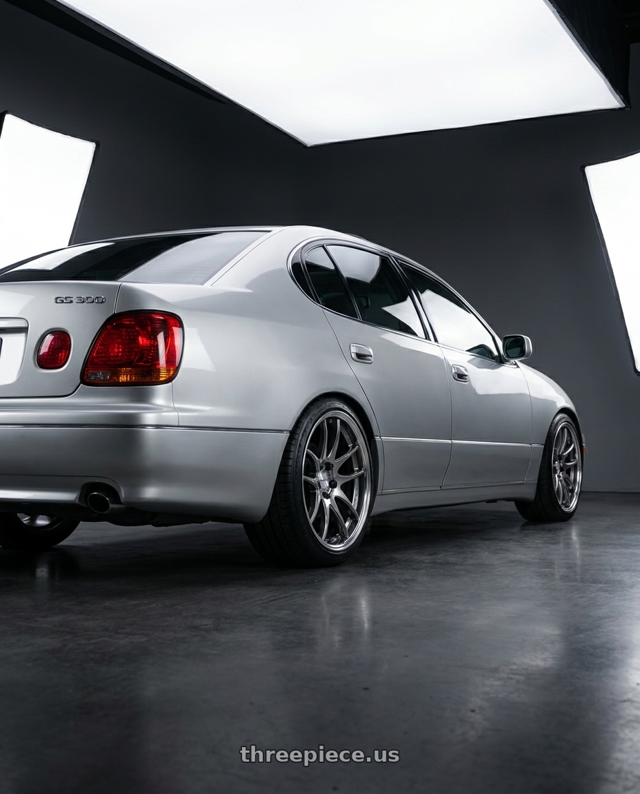 2001 Lexus gs300 with Work Cr 2P 5x114.3 18x9.5 +38 GT Silver wheels rear three quarter view square tires