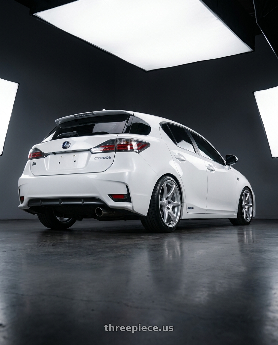 2015 Lexus CT200h F sport with Kansei K11S Tandem 5x114.3 18x9 12 Hyper Silver wheels rear three quarter view square tires