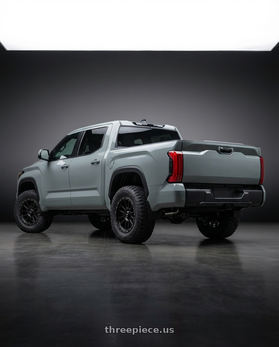 2024 Toyota Tundra with Vision Off-Road 111 Nemesis 6x139.7 20x9+12 Matte Black wheels rear three quarter view meaty tires