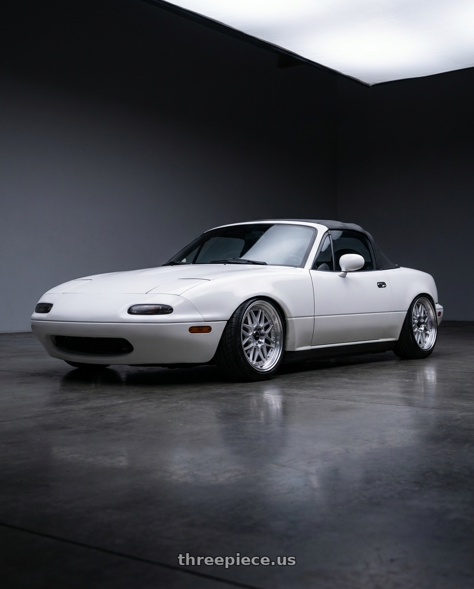 1990 Mazda Miata base model with Vors VR7 4x100/4x114.3 15x7  +35 Silver Machine Face Lip Chrome Rivet wheels