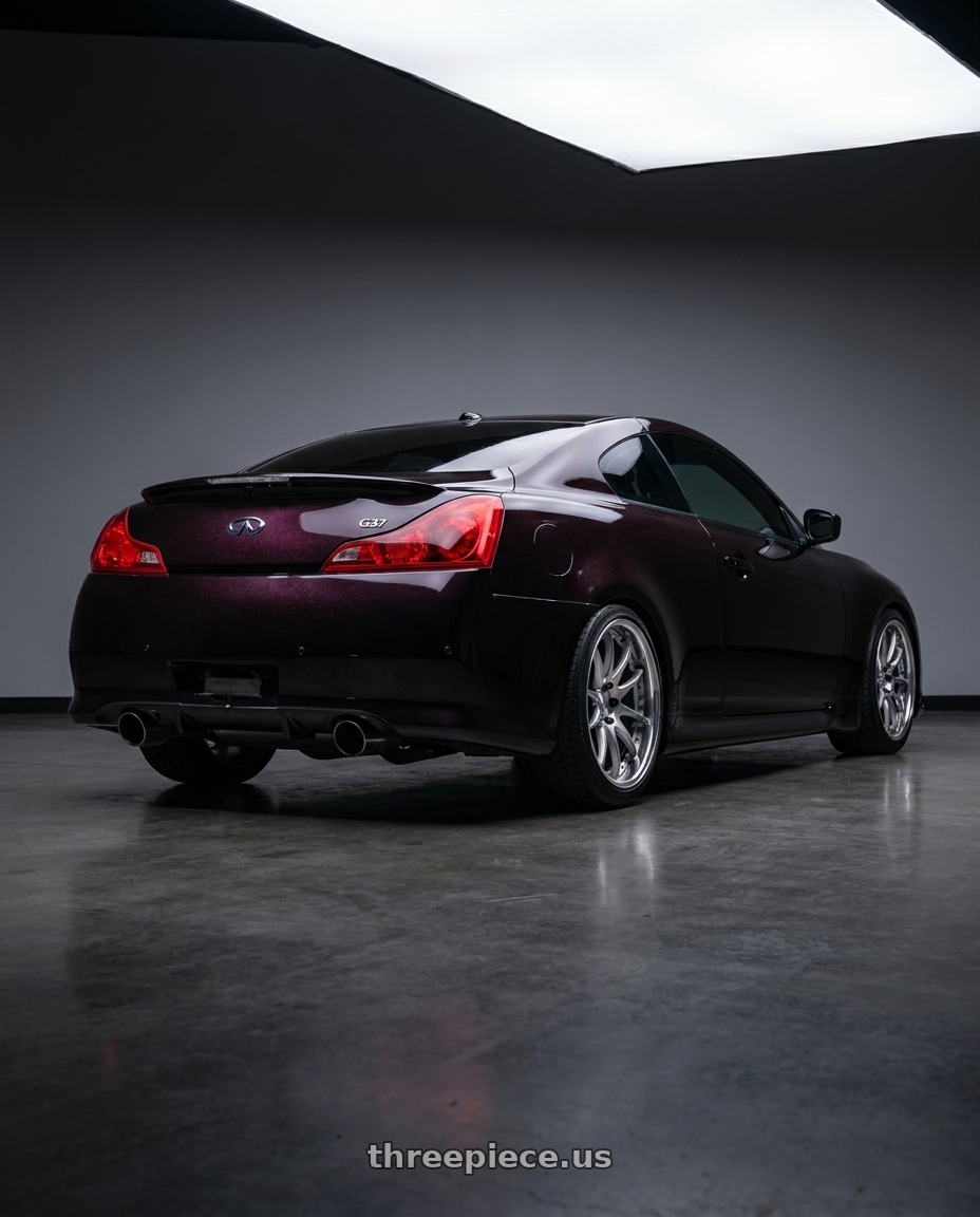 2011 Infiniti g37 with Work Emotion Cr 3P 5x100 18x9.5+20 R Disk Burning Silver wheels rear three quarter view square tires