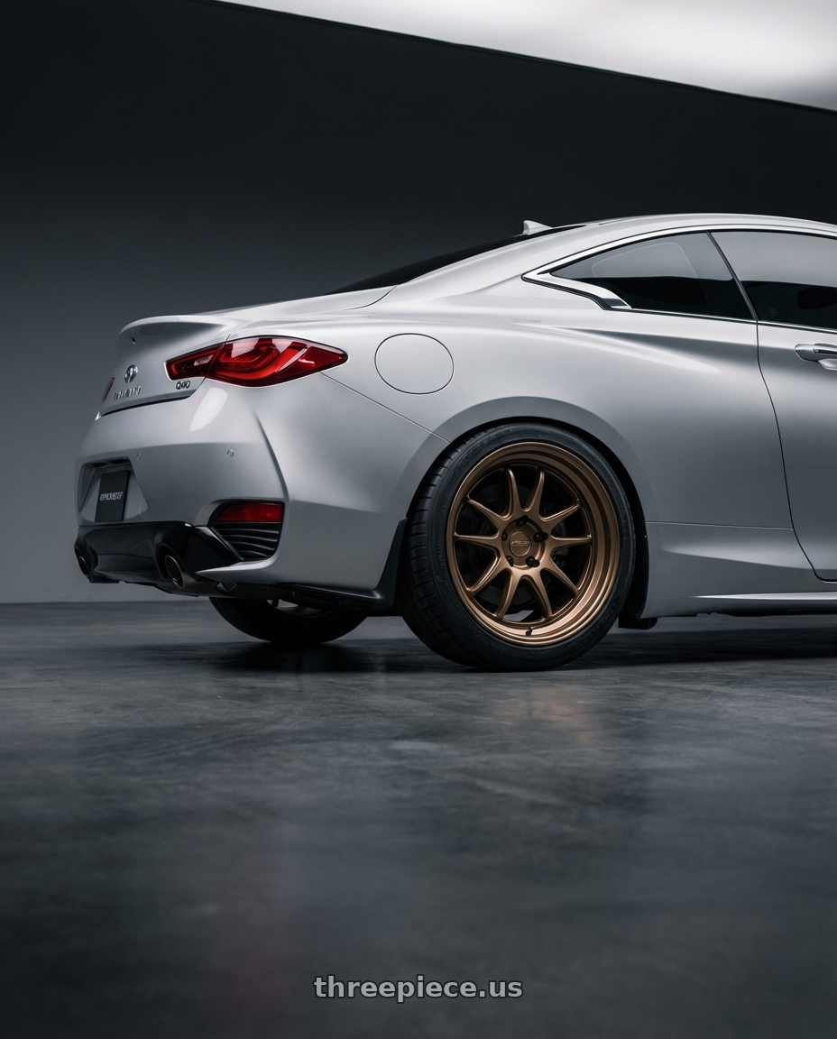 2020 Infiniti Q60 with Kansei K11B Tandem 5x114.3 19x9.5 12 Bronze wheels rear three quarter view square tires