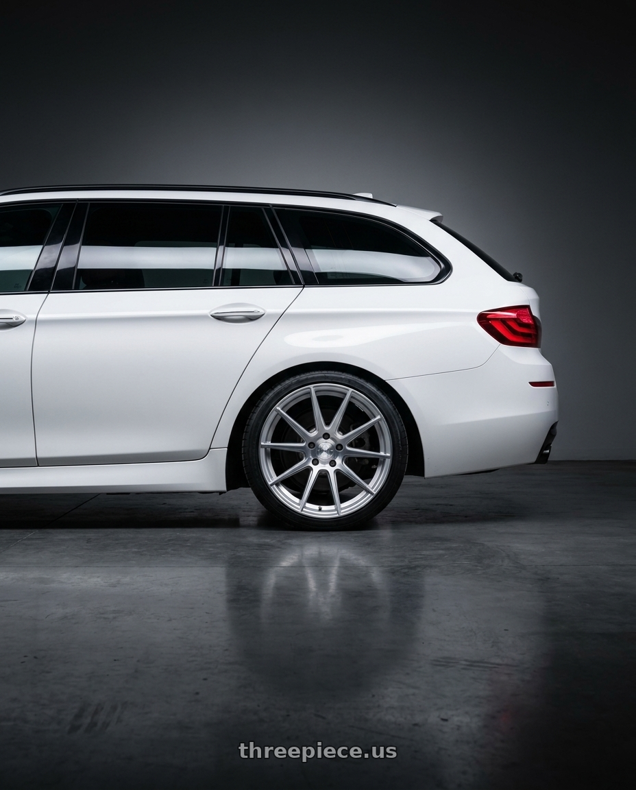 2016 bmw 550d white with Avant Garde Wheels M615 5X120 20x10 +38 Silver Machine wheels rear three quarter view square tires