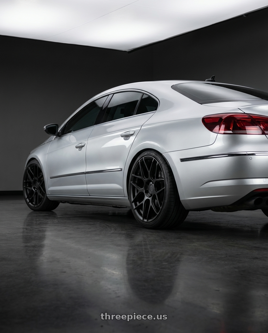 2015 Volkswagen CC with Aodhan AFF2 5x112 19x8.5+35 Matte Black wheels rear three quarter view square tires