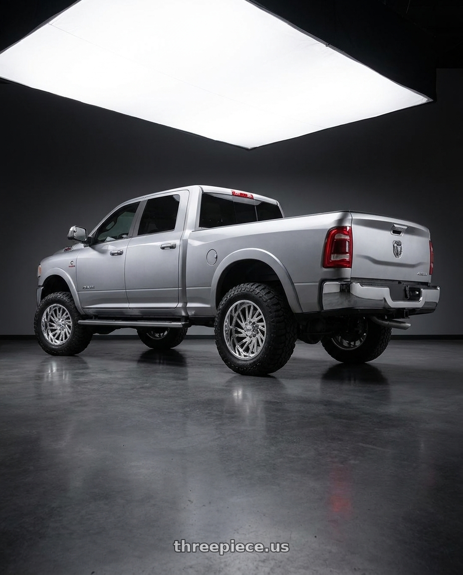 2019 dodge ram 2500 with Moto Metal COMBAT 8x165.1 20x10 -18 Chrome wheels rear three quarter view meaty tires