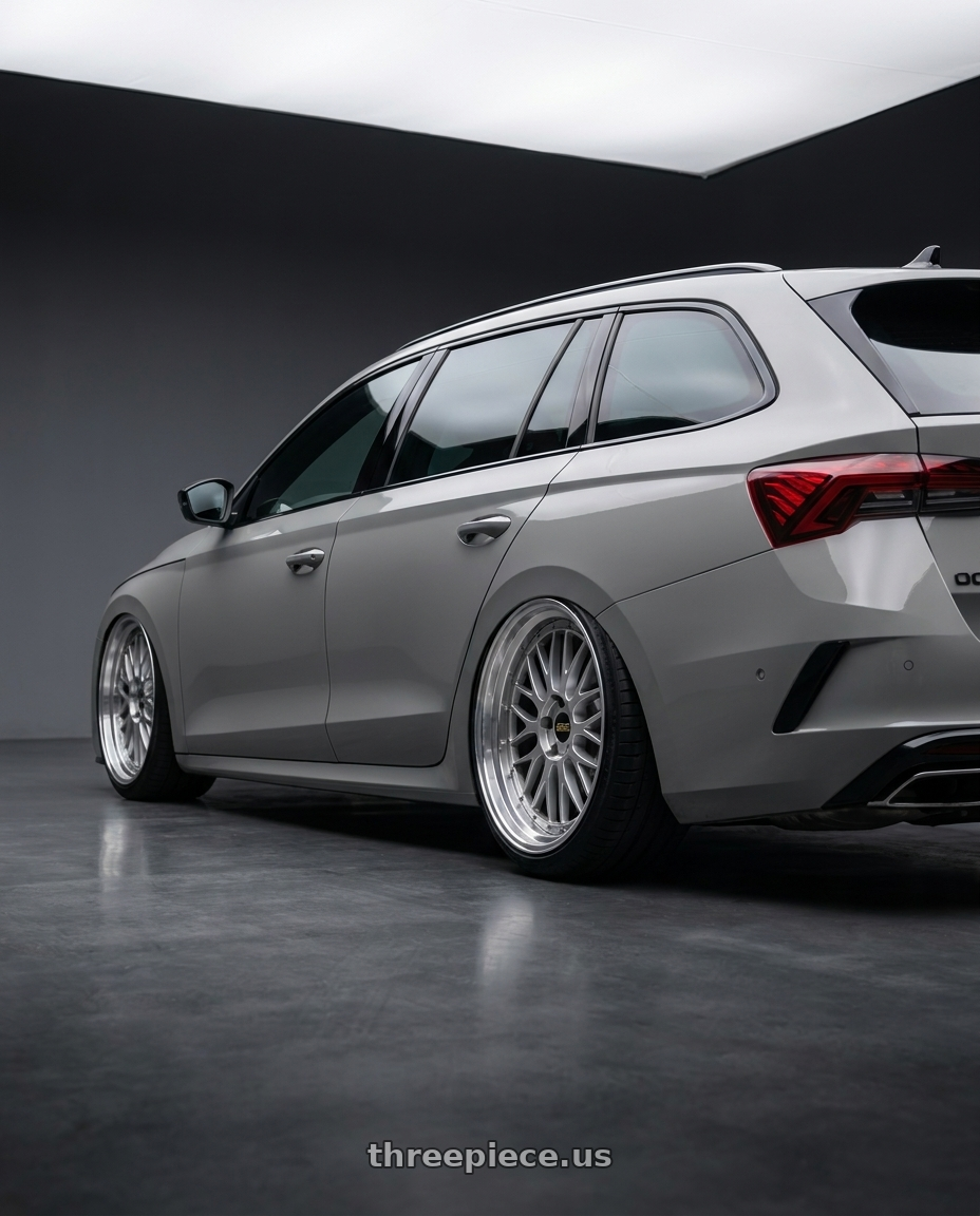 2026 Octavia combi RS  with BBS LM 5x112 20x9.0+25 Diamond Silver wheels rear three quarter view extreme stretch tires