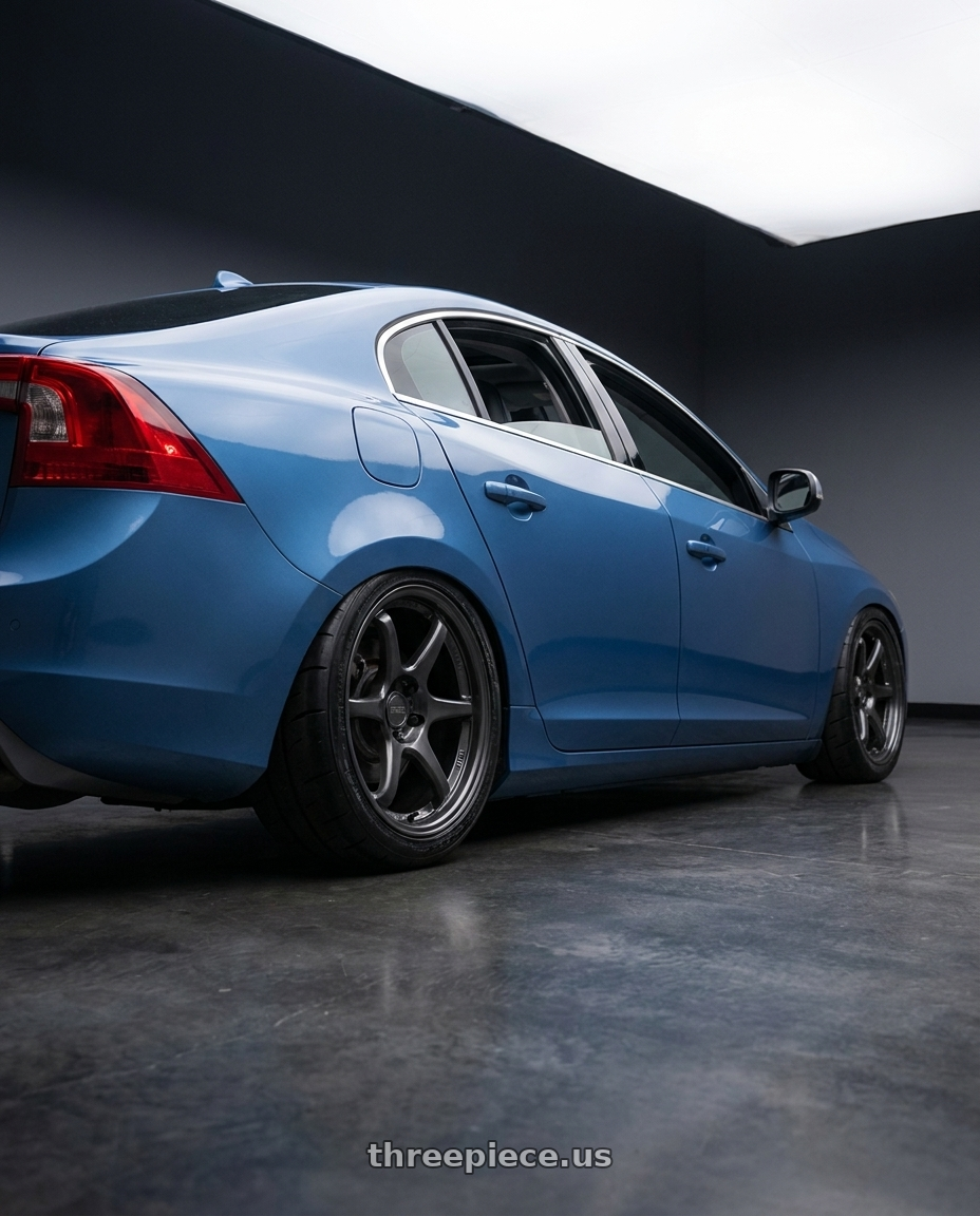 Volvo 2015 s60 with Kansei K11G Tandem 5X100 18x9 12 Gunmetal wheels rear three quarter view square tires
