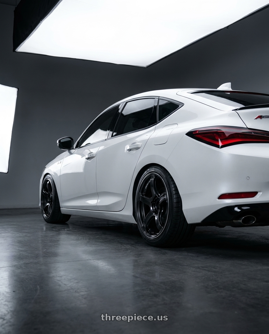 2025 Acura Integra A Spec Platinum White with Advan Racing TC4 5x114.3 18x8.5 +45 BLACK GUNMETALLIC & RING wheels rear three quarter view slight stretch tires