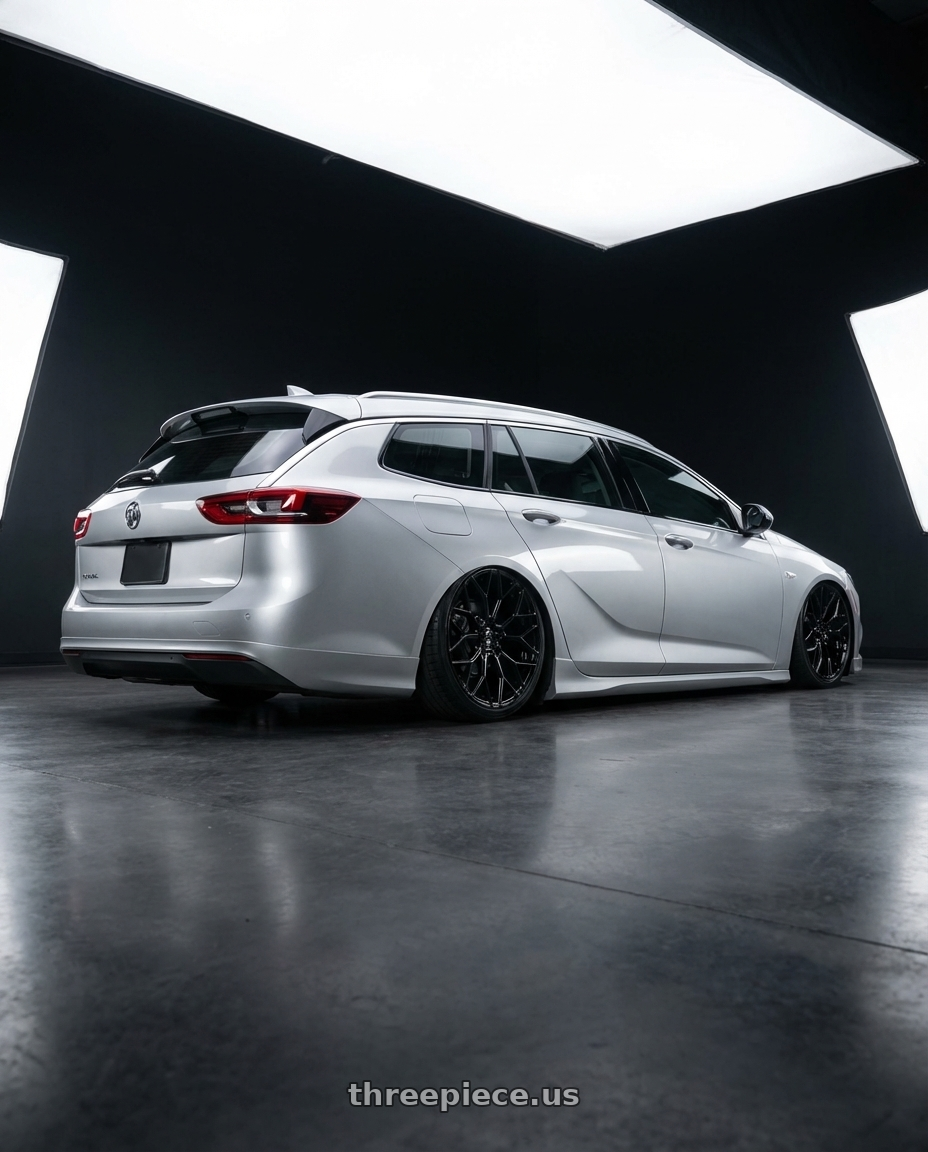 2018 buick regal tourx wagon Silver with DOLCE PERFORMANCE PISTA 5x112 20x10 +40 Gloss Black wheels rear three quarter view slight stretch tires