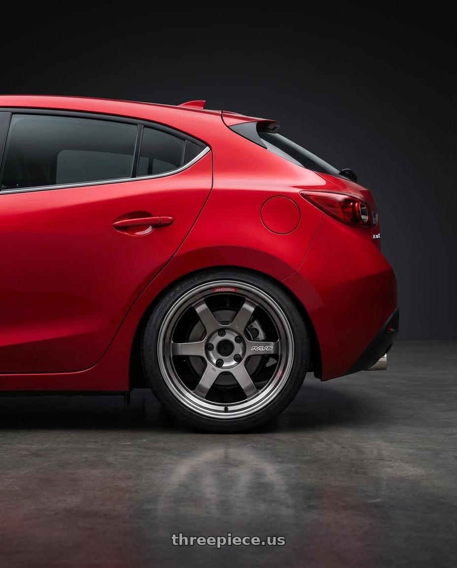 2014 Mazda 3 with Volk Racing TE37V PRO 5x114.3 17x10.5+0 Pressed Graphite wheels rear three quarter view square tires